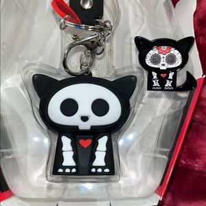Kit Cat skelanimals keychain and pin set